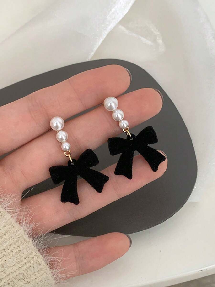 ETHEREAL BOW EARRINGS